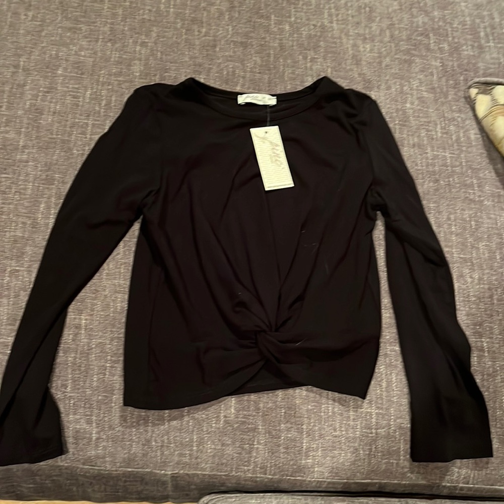 Pinc premium black Tshirt with twisted front size medium.